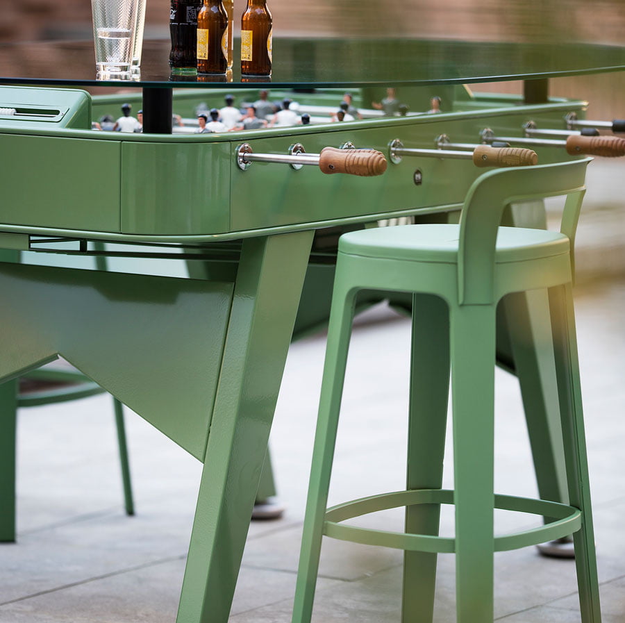 RS Barcelona foosball table with drinks on tabletop surface