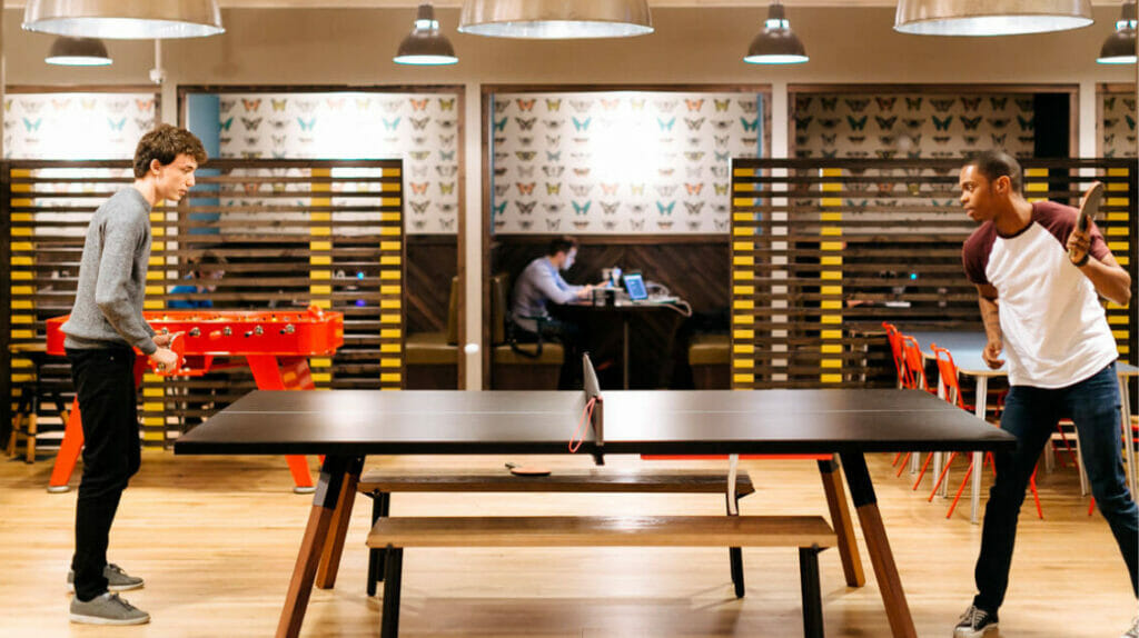 Two Men Playing Table Tennis