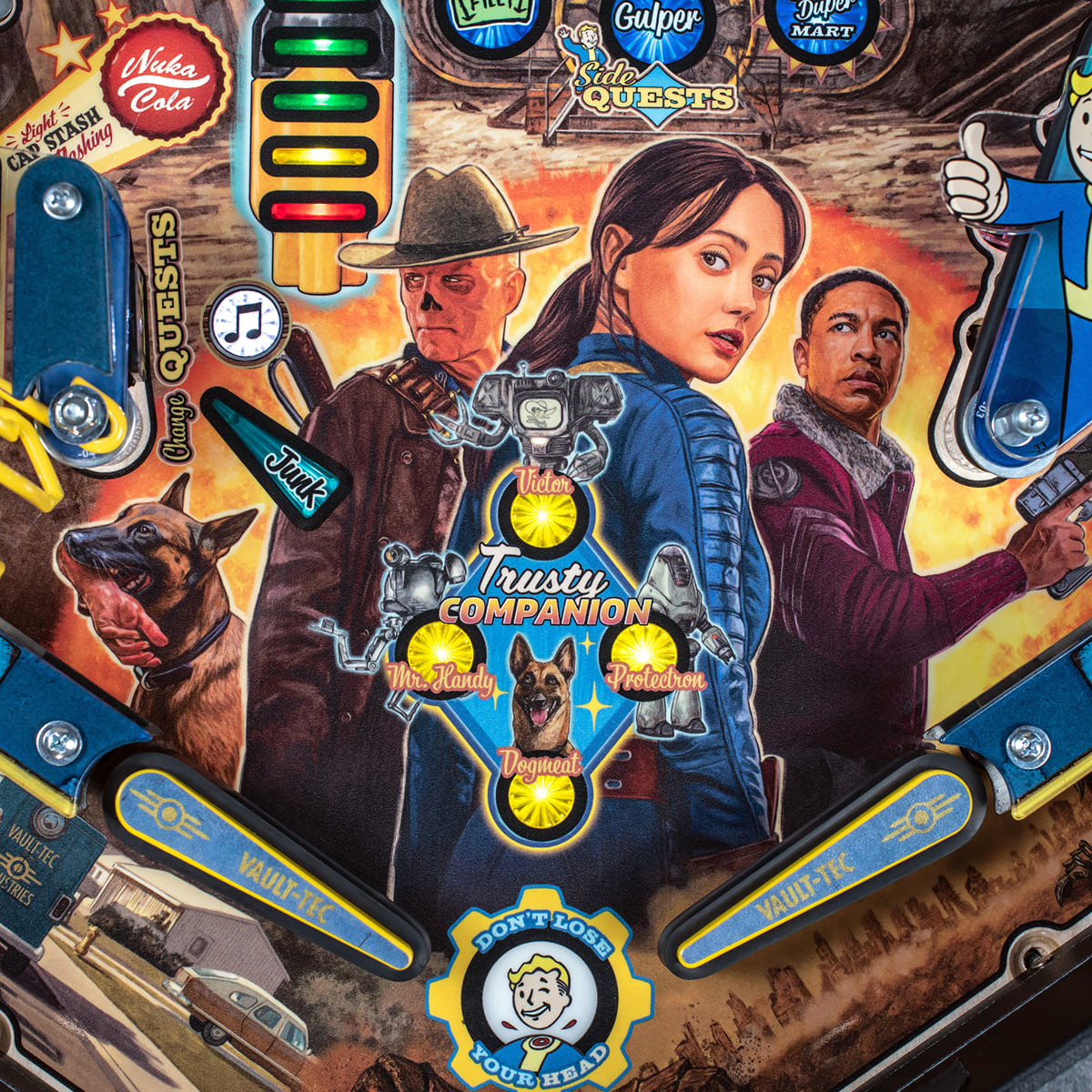 Fallout pinball playfield artwork featuring character artwork and Vault-Tec details.