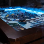 A 6ft Kingswood gaming table playfield illuminated by a striking blue LED border.