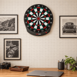 GranBoard Dash Green electronic dartboard mounted on the wall in a home.
