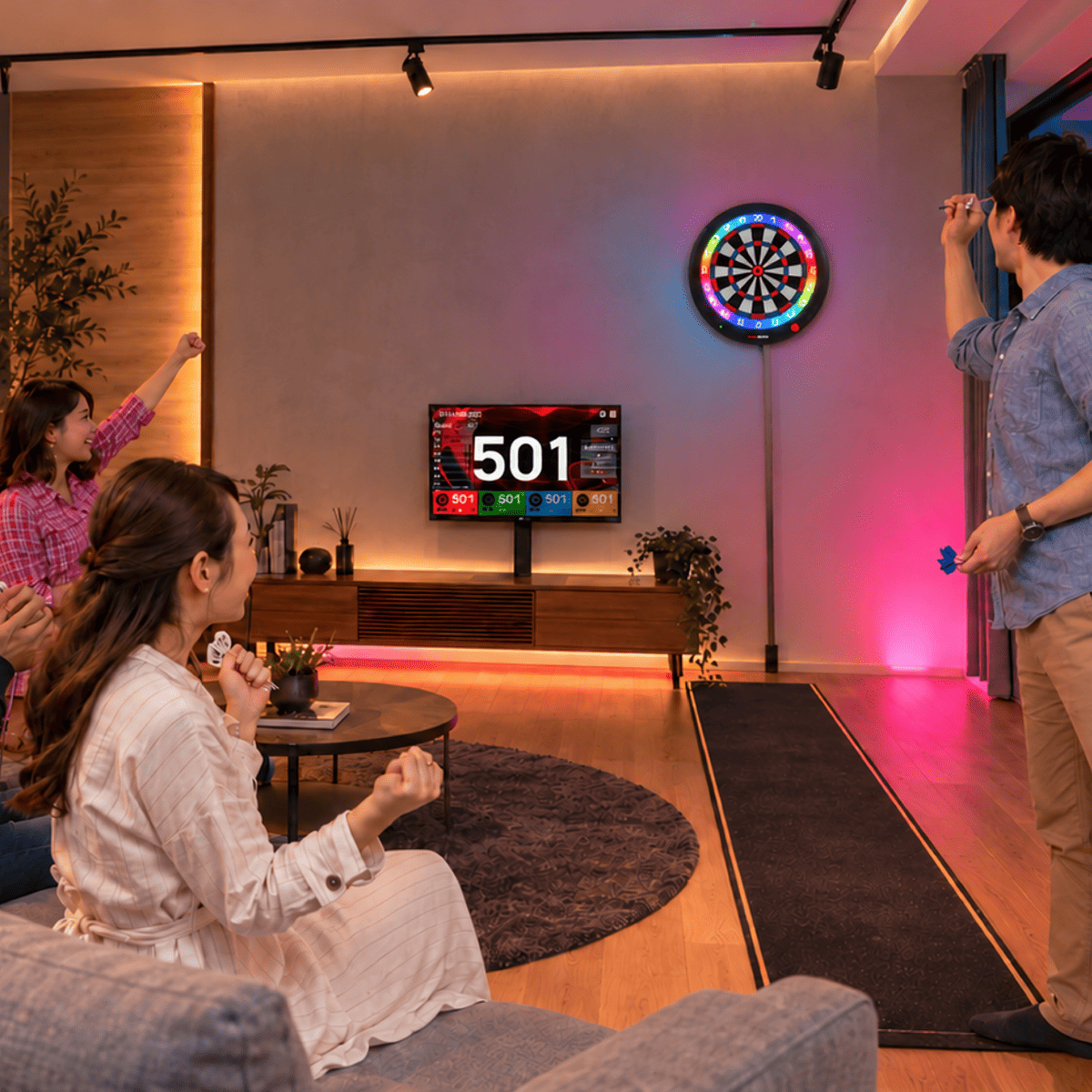 Player playing on the GranBoard 3S Blue electronic dartboard.